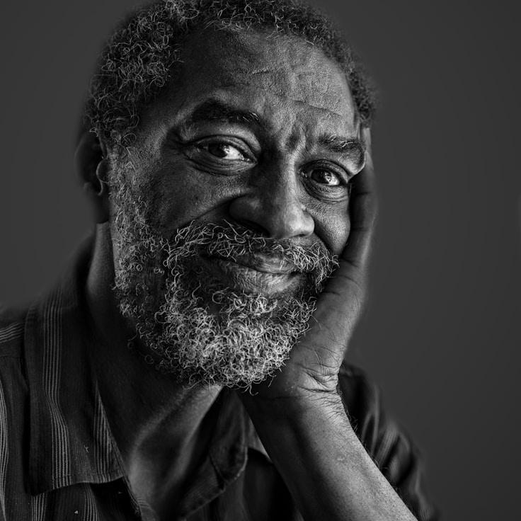 Kaveri Mehta, Lead Design Curator at River Garden Calm, reviewing corporate floral arrangements